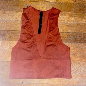 Orange urban outfitters plunge crop top.